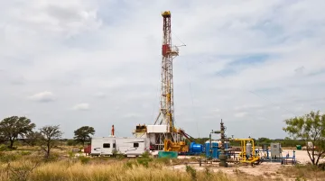 Natural gas drilling rig operating on East Texas well site