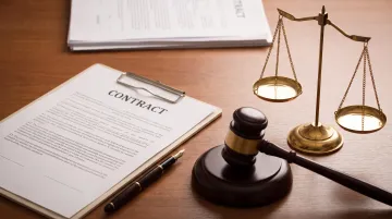 Courtroom gavel and legal documents representing oil and gas litigation