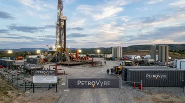 Natural gas drilling site representing PetroVybe development project financing structure