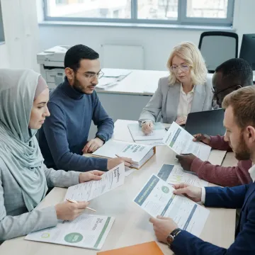Small business team reviewing health benefits