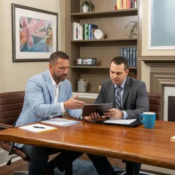 Advisor discussing church employee benefits