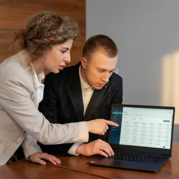 Payroll specialist assisting a small business
