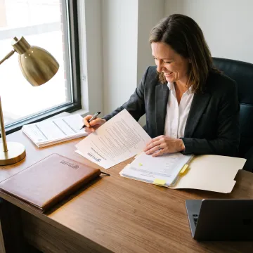 Compliance professional reviewing BOI reporting records