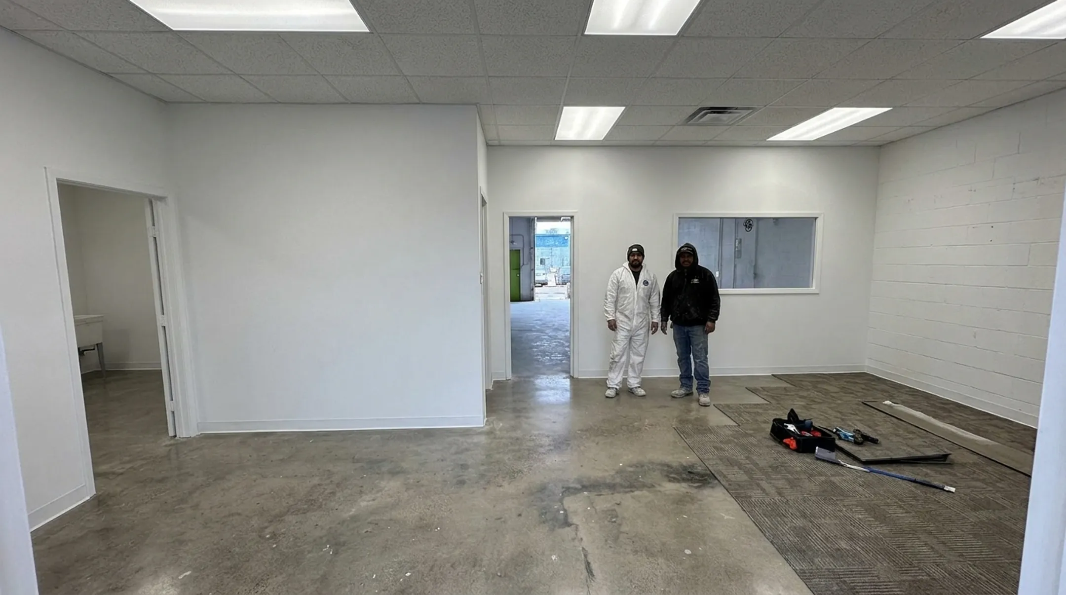 Pilot Painting and Construction team completing commercial tenant improvement project