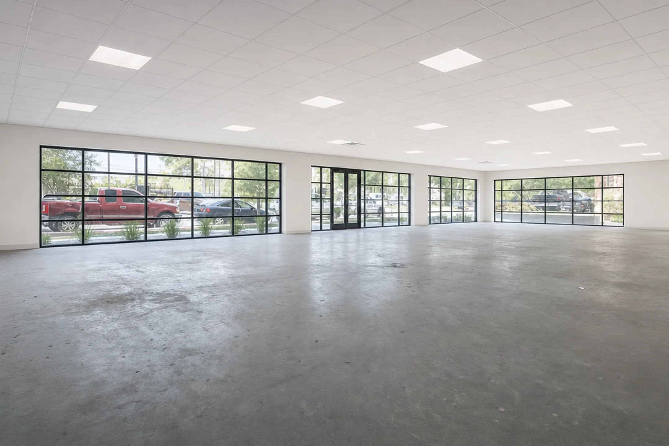 Vanilla shell commercial interior with primed walls and working lighting