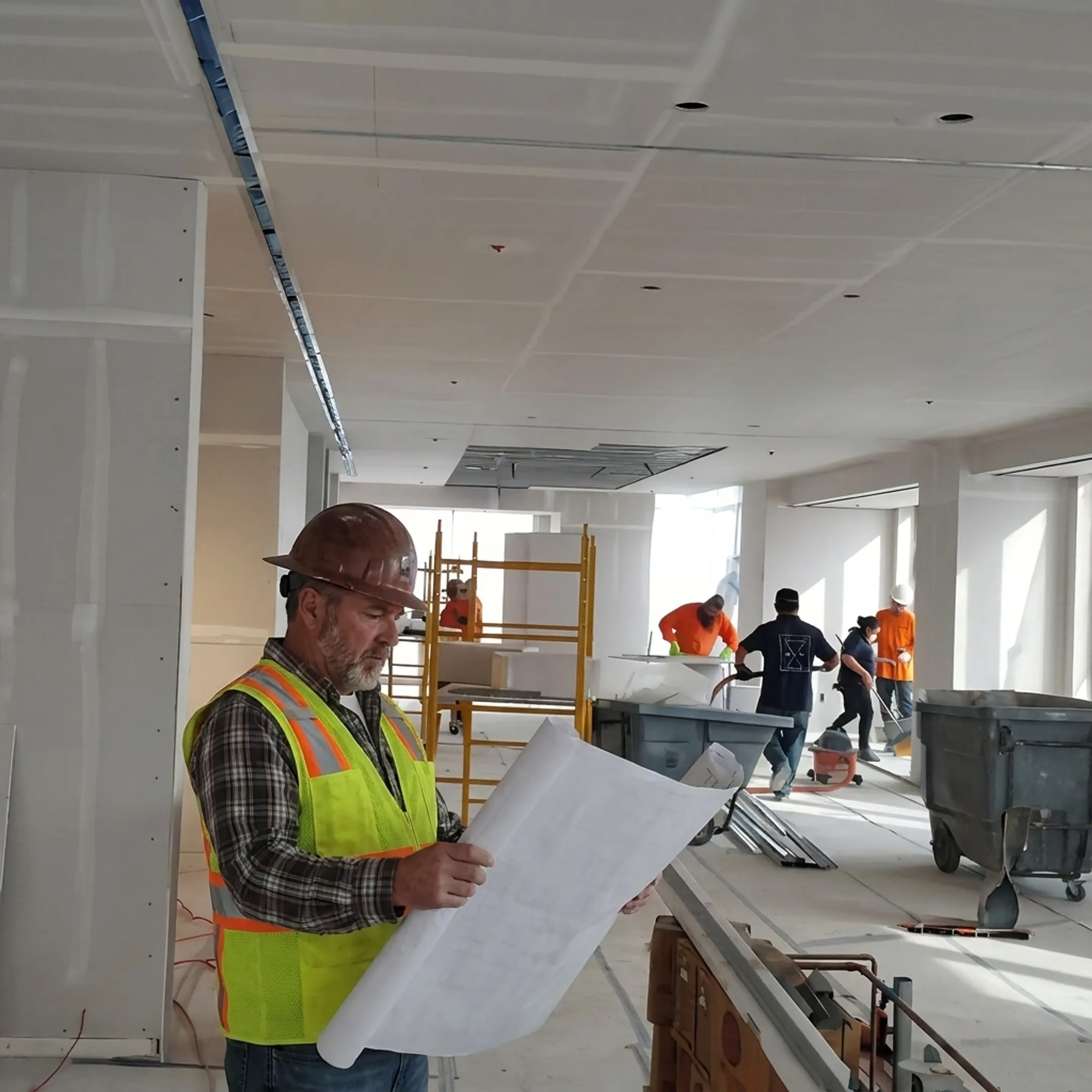 Contractor reviewing restaurant renovation plans
