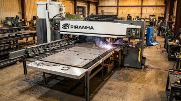Piranha combination punch plasma machine performing cutting and marking operations