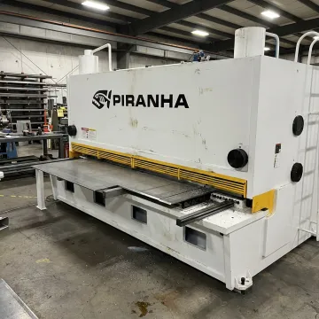 Sheet metal shear cutting a steel sheet