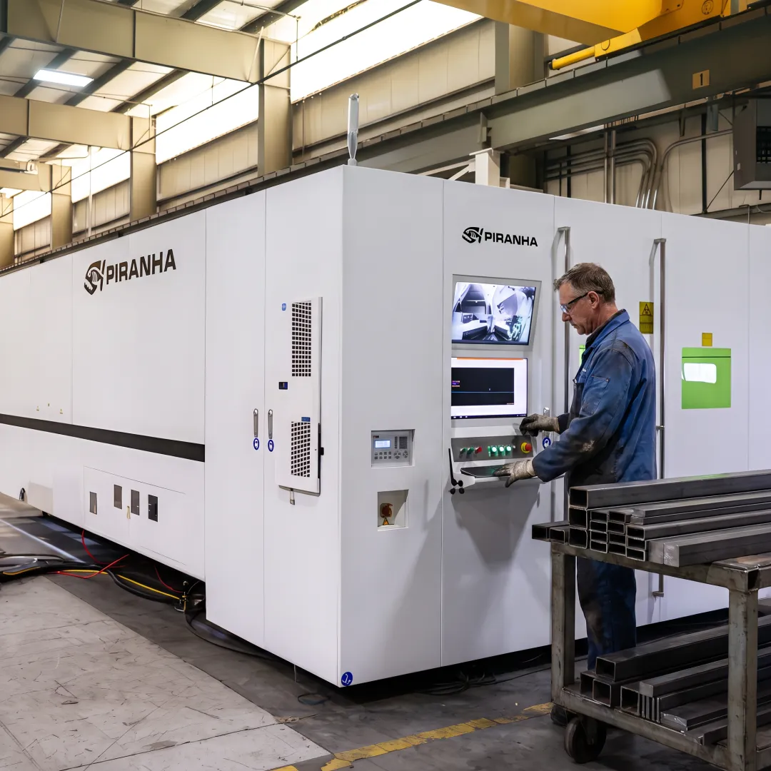 Fabrication technician operating precision metal cutting equipment
