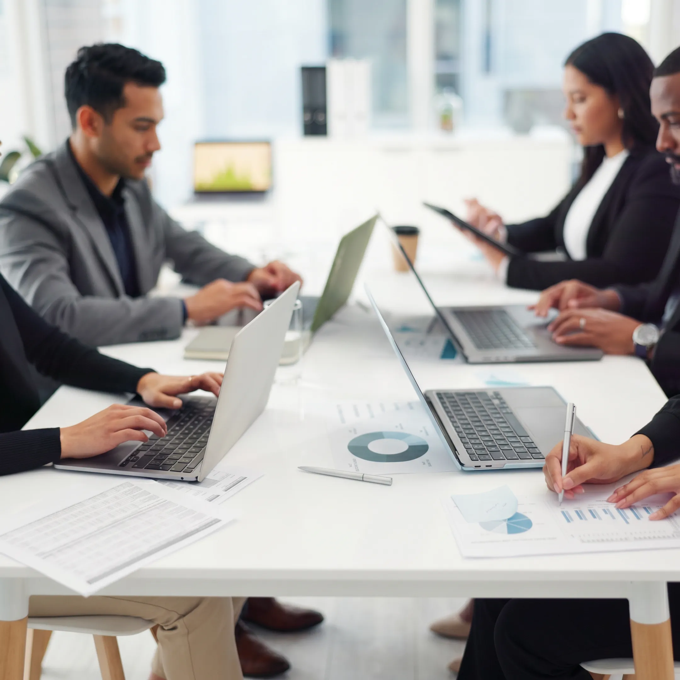 Franchise owner reviewing organized bookkeeping reports