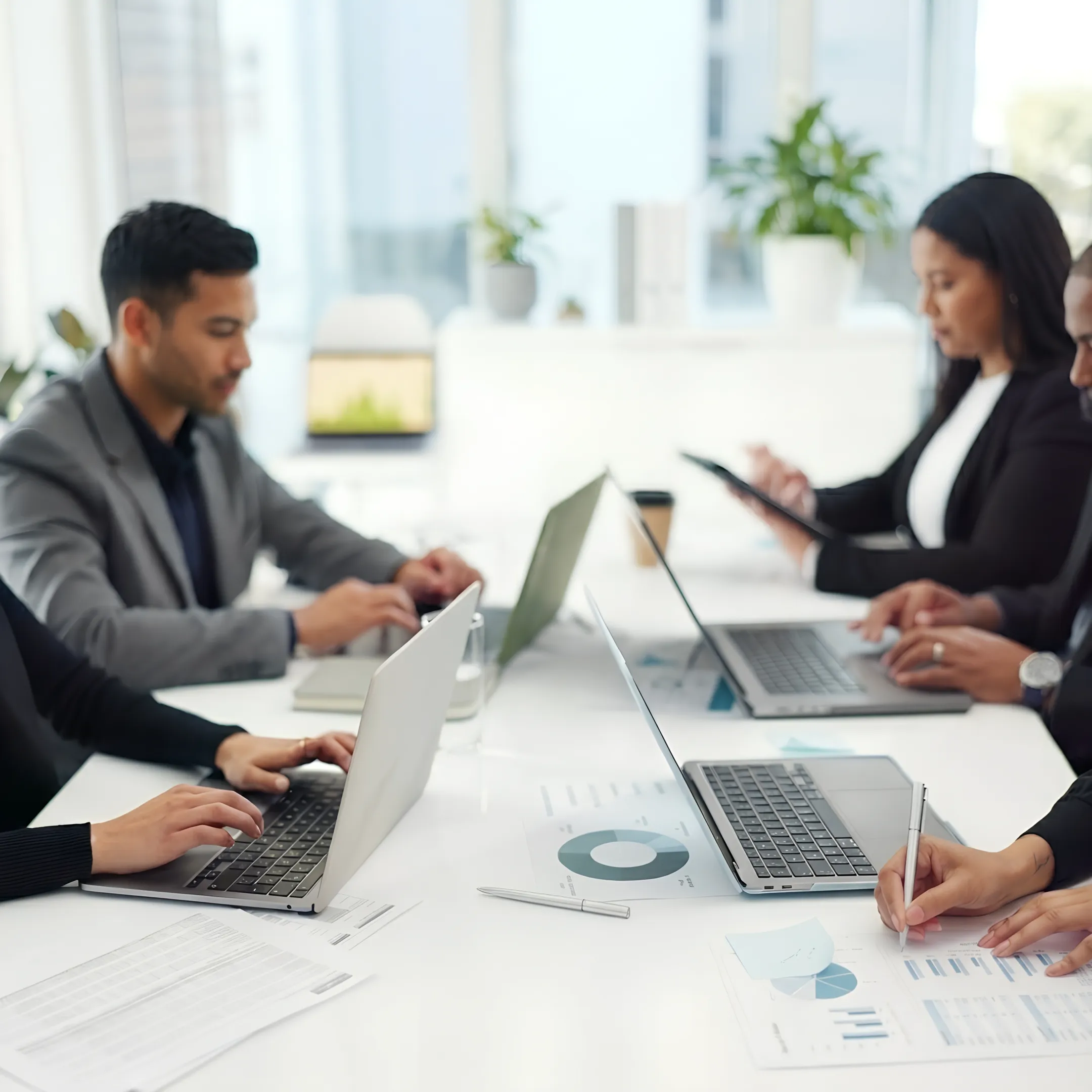 Business owner reviewing bookkeeping reports with accountant