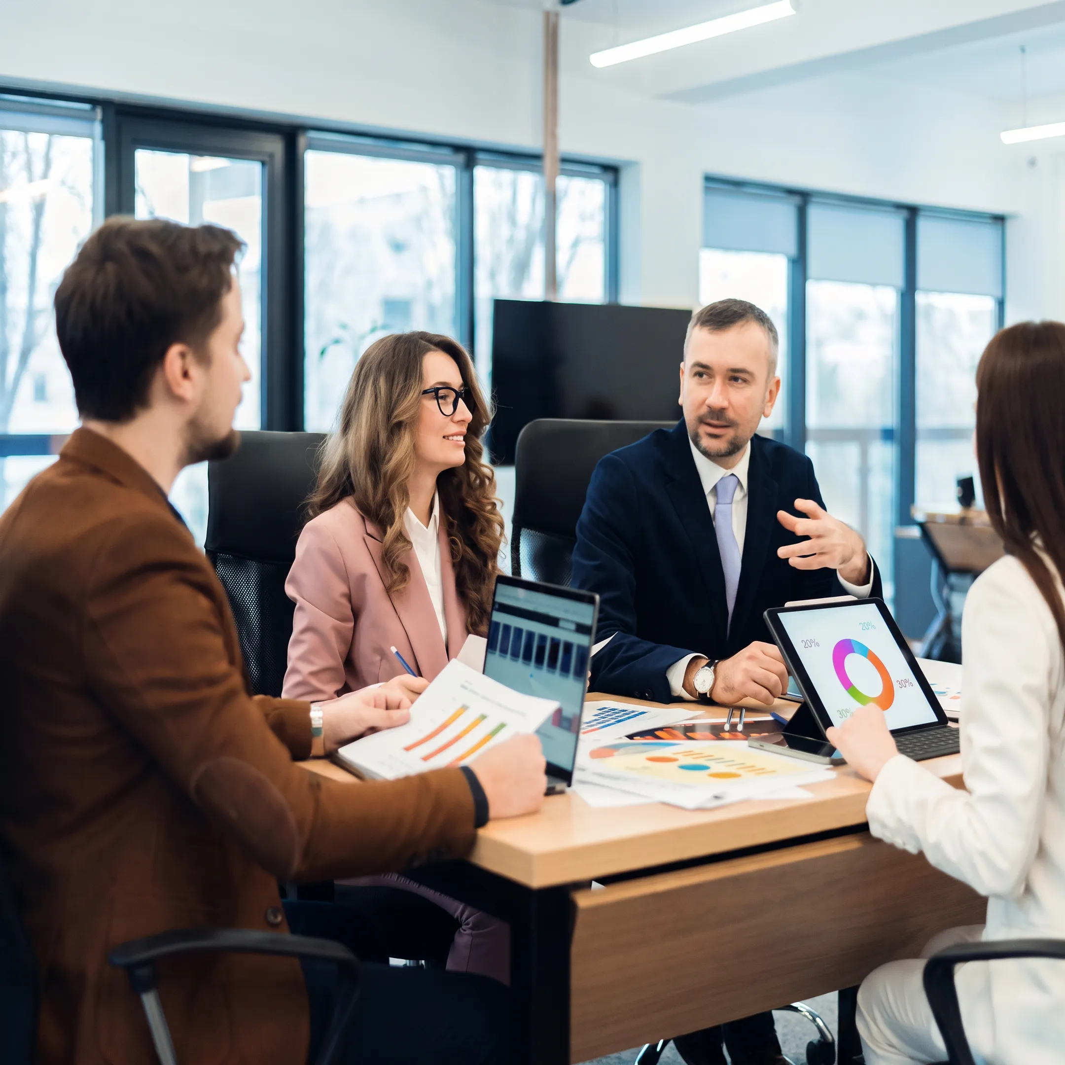 Advisor discussing business finances with an owner