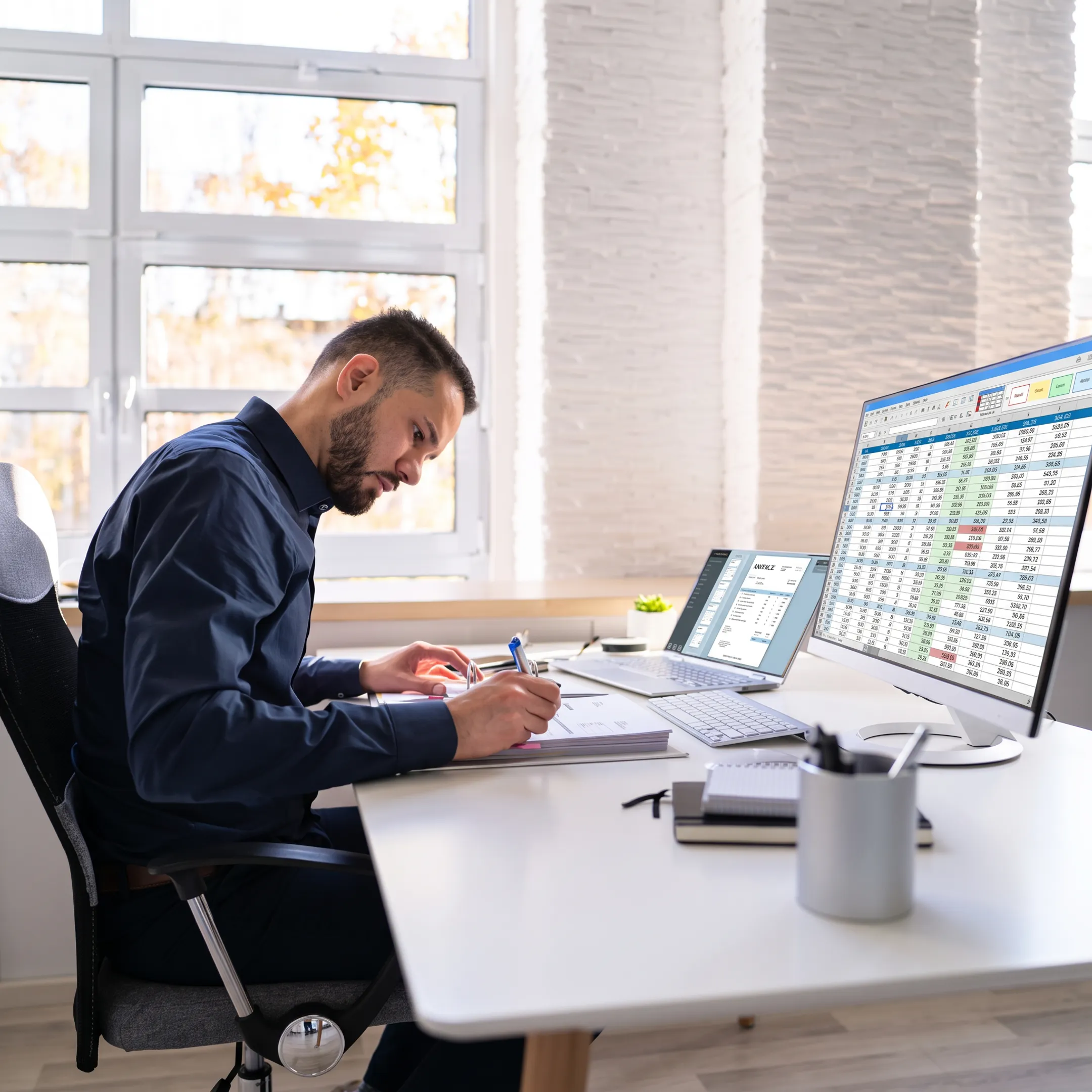Accounting professional organizing business financial reports