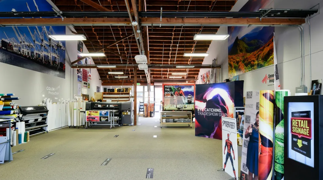 Large-format specialty printing facility producing vehicle wraps and environmental graphics