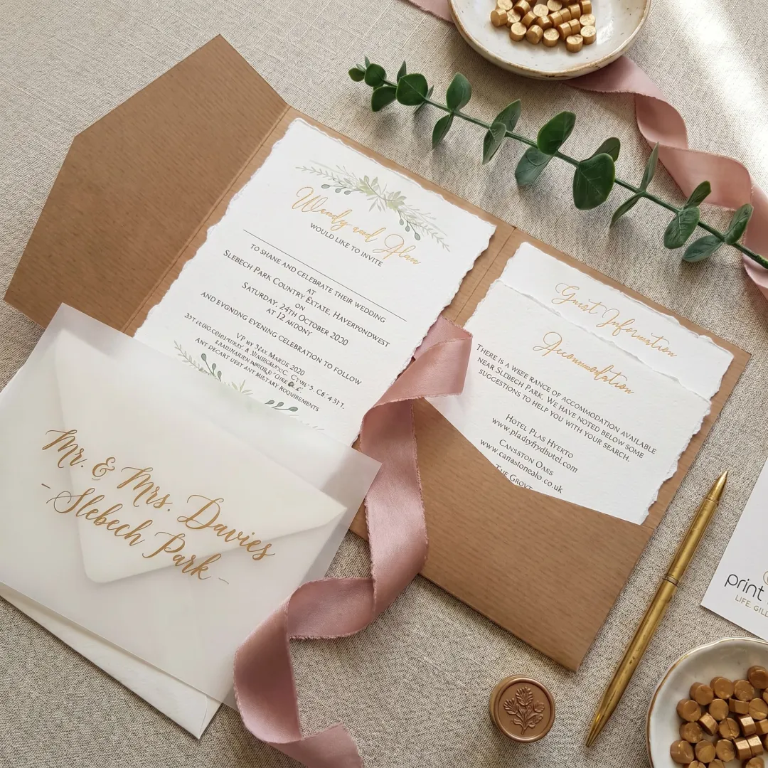 Custom wedding invitation suite with foil details