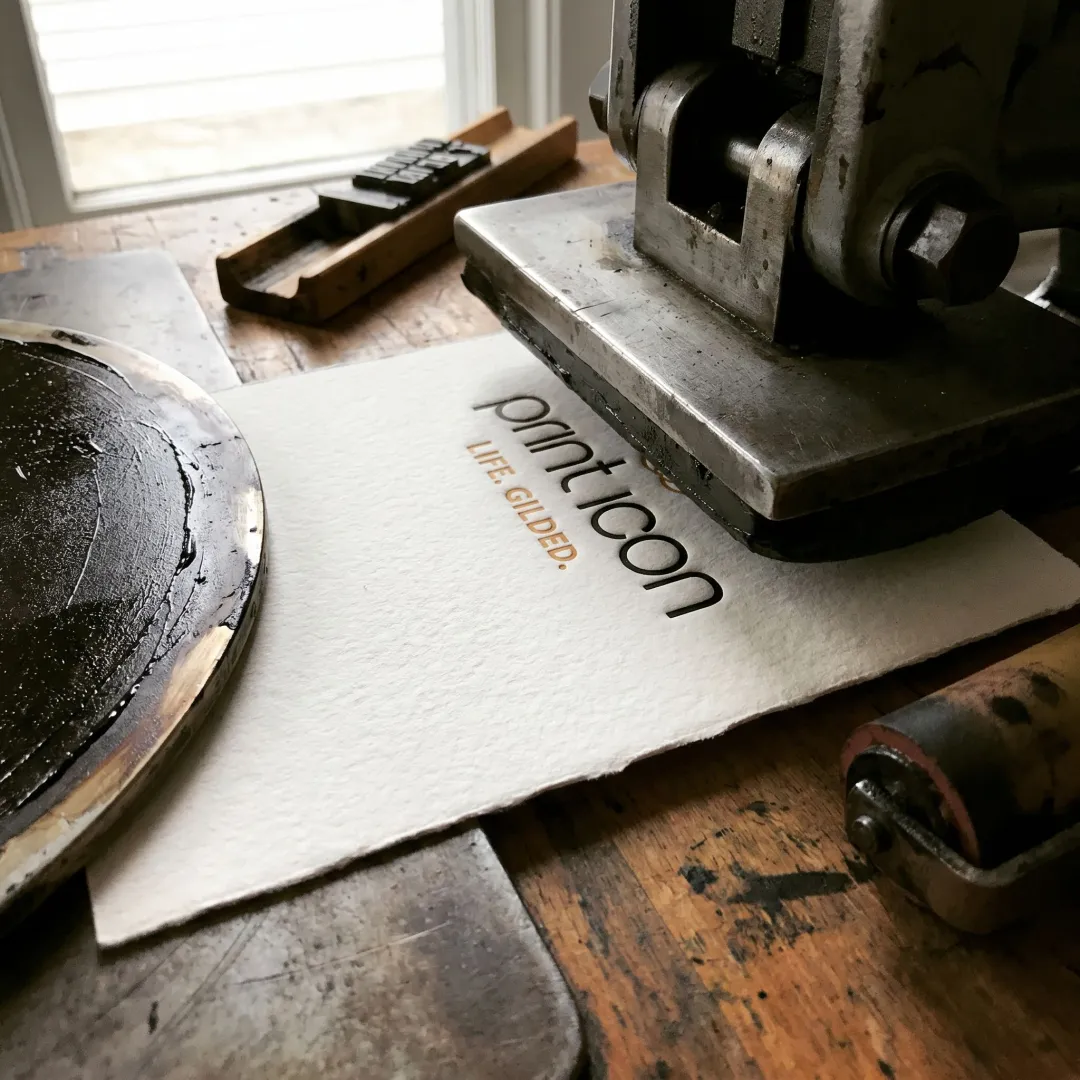 Letterpress invitation being printed on cotton paper