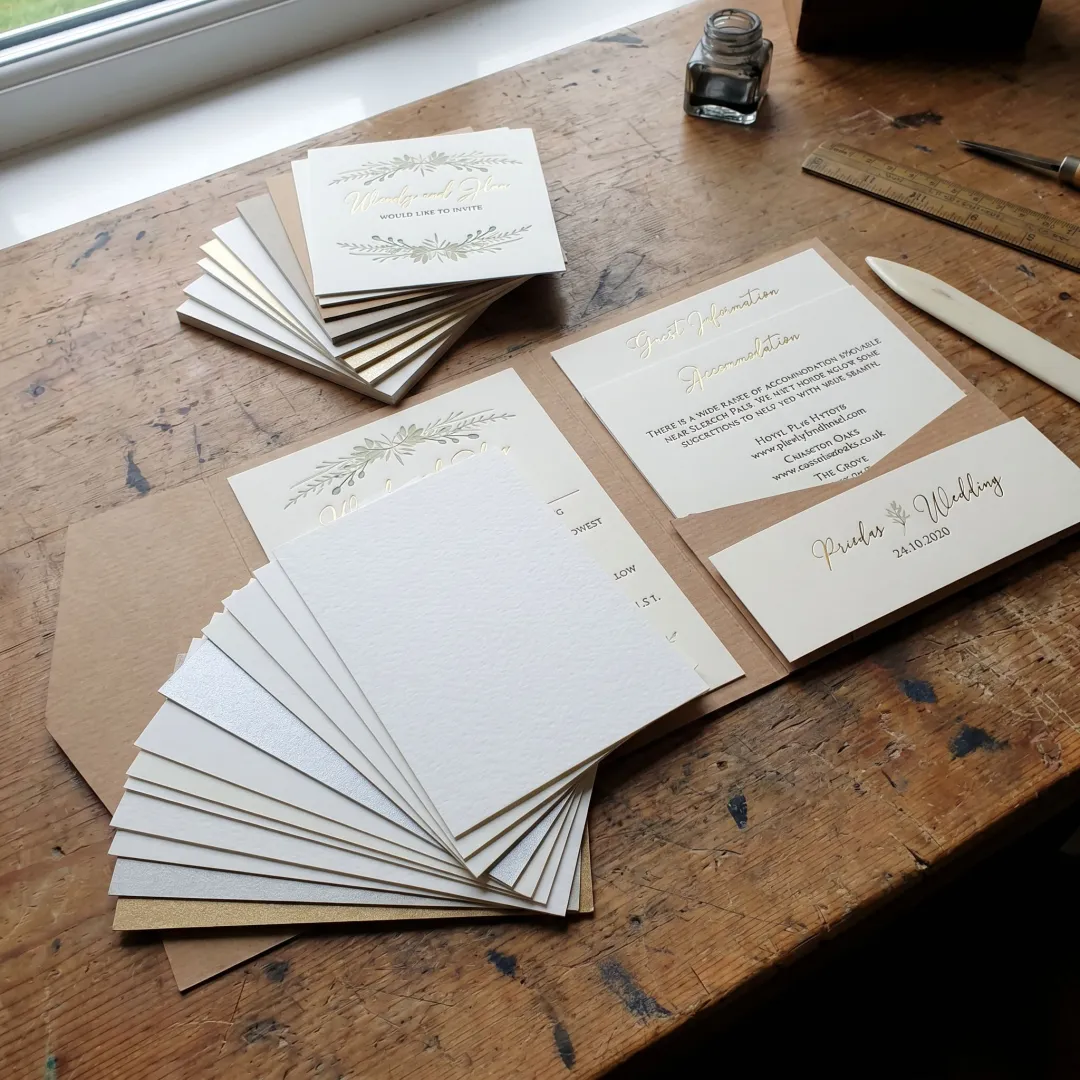 Custom wedding invitation suite with foil and envelopes