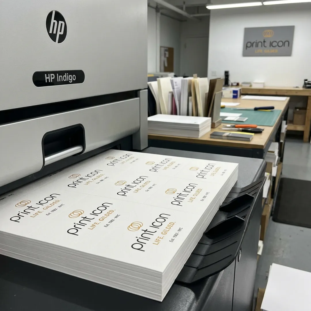Business cards being printed in a NYC print shop