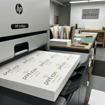 Business cards being printed in a NYC print shop