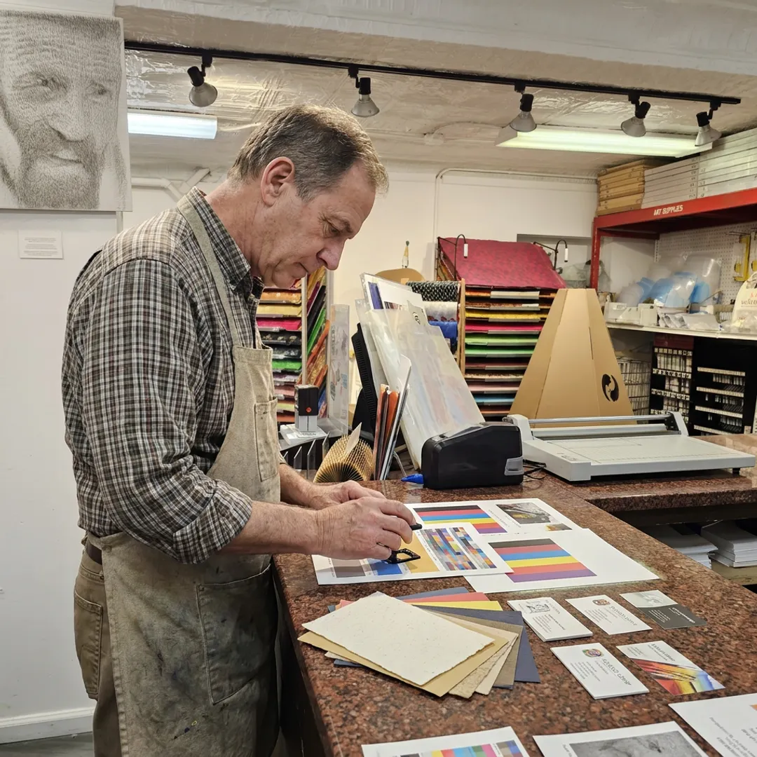 Print technician reviewing proofs