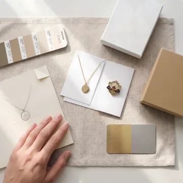 Designer reviewing custom jewelry samples