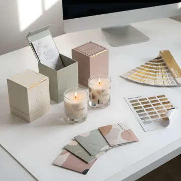 Custom printed candle boxes with branded inserts and foil accents