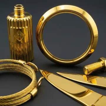 Close-up of golden titanium nitride PVD coating on precision components