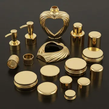 Close-up of gold-plated cosmetic components showing mirror finish quality