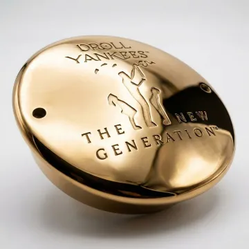 Close-up of polished brass plaque surface showing mirror finish quality