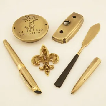 Array of brushed brass finished components showing various textures and applications