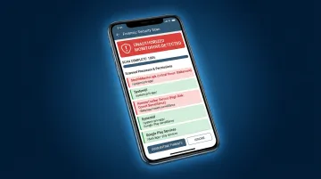 Stalkerware detection on smartphone screen showing unauthorized monitoring application alert