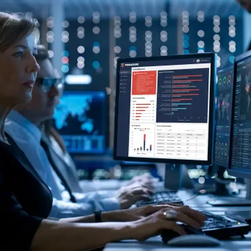 Cybersecurity analyst reviewing vulnerability scan results