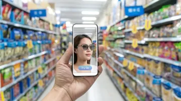 Shopper using smartphone AR try-on experience scanning product packaging in retail store