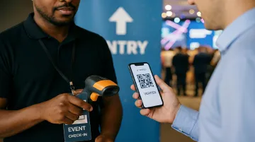 Event attendees scanning QR code tickets at modern conference venue entry gate