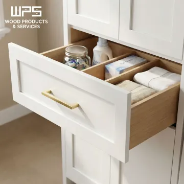 White laundry cabinets showing soft-close drawer mechanism and organized storage