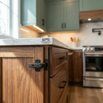 Custom wood and painted kitchen cabinets installed in a modern home