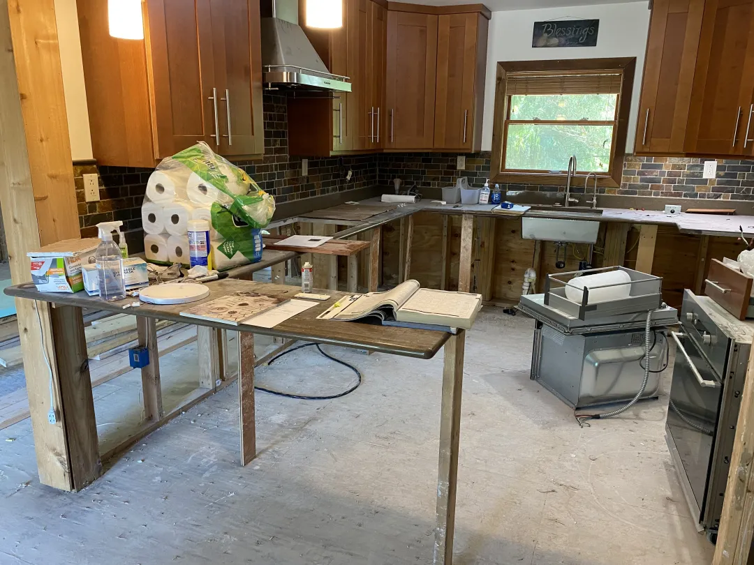 Solid oak kitchen cabinets installed in a bright, modern kitchen