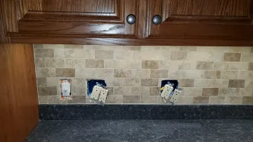 Before and after kitchen cabinet refinishing transformation