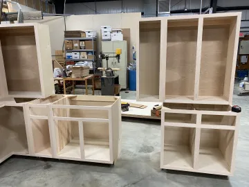 Cabinet refinishing process steps showing preparation and finishing in a Phoenix home