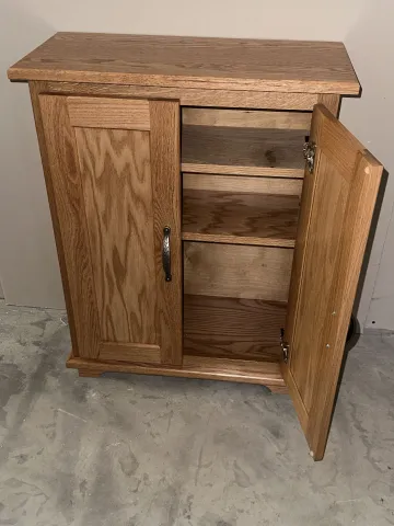 Custom dual bathroom vanity with separate storage units and matching wood finishes