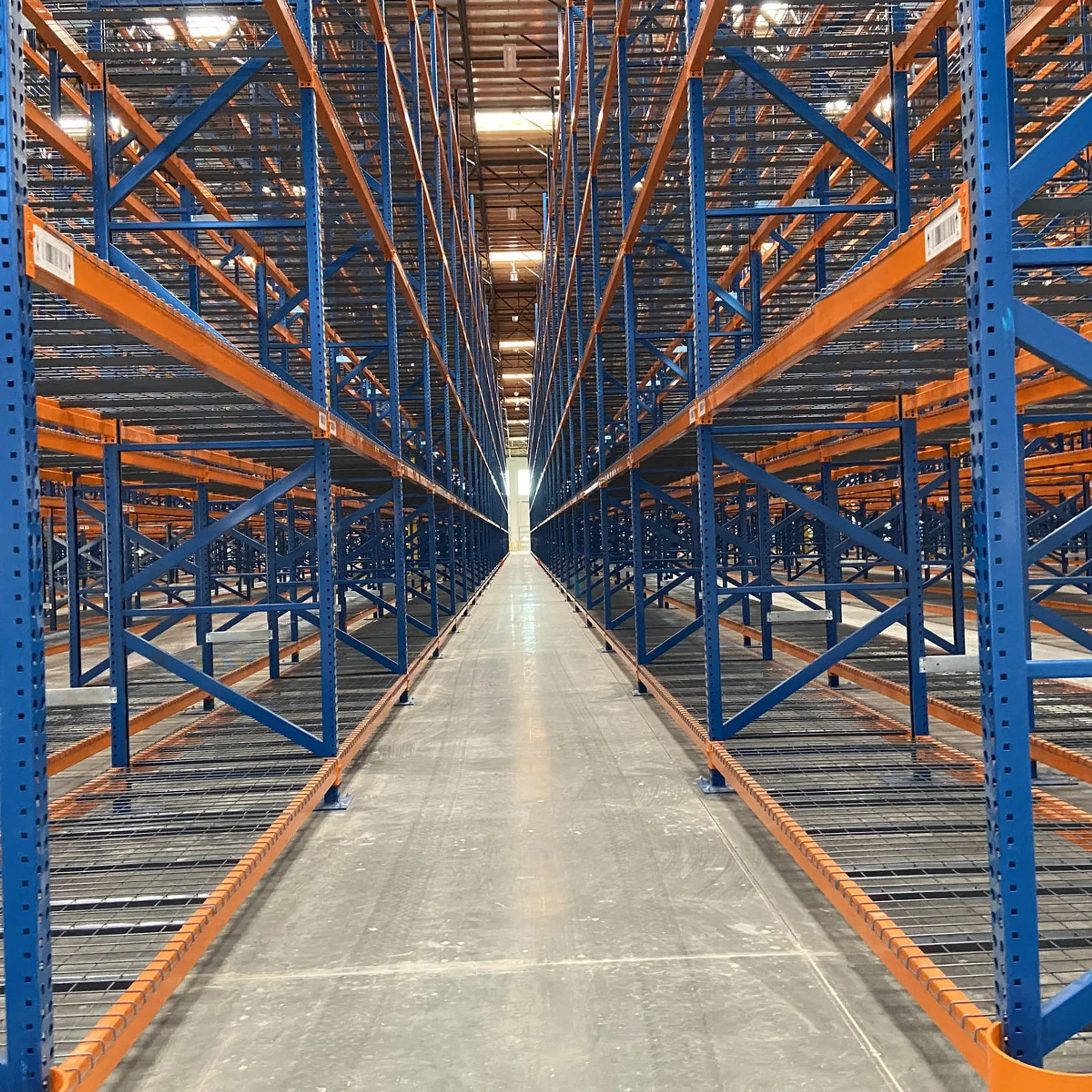 Warehouse specialist reviewing pallet rack design