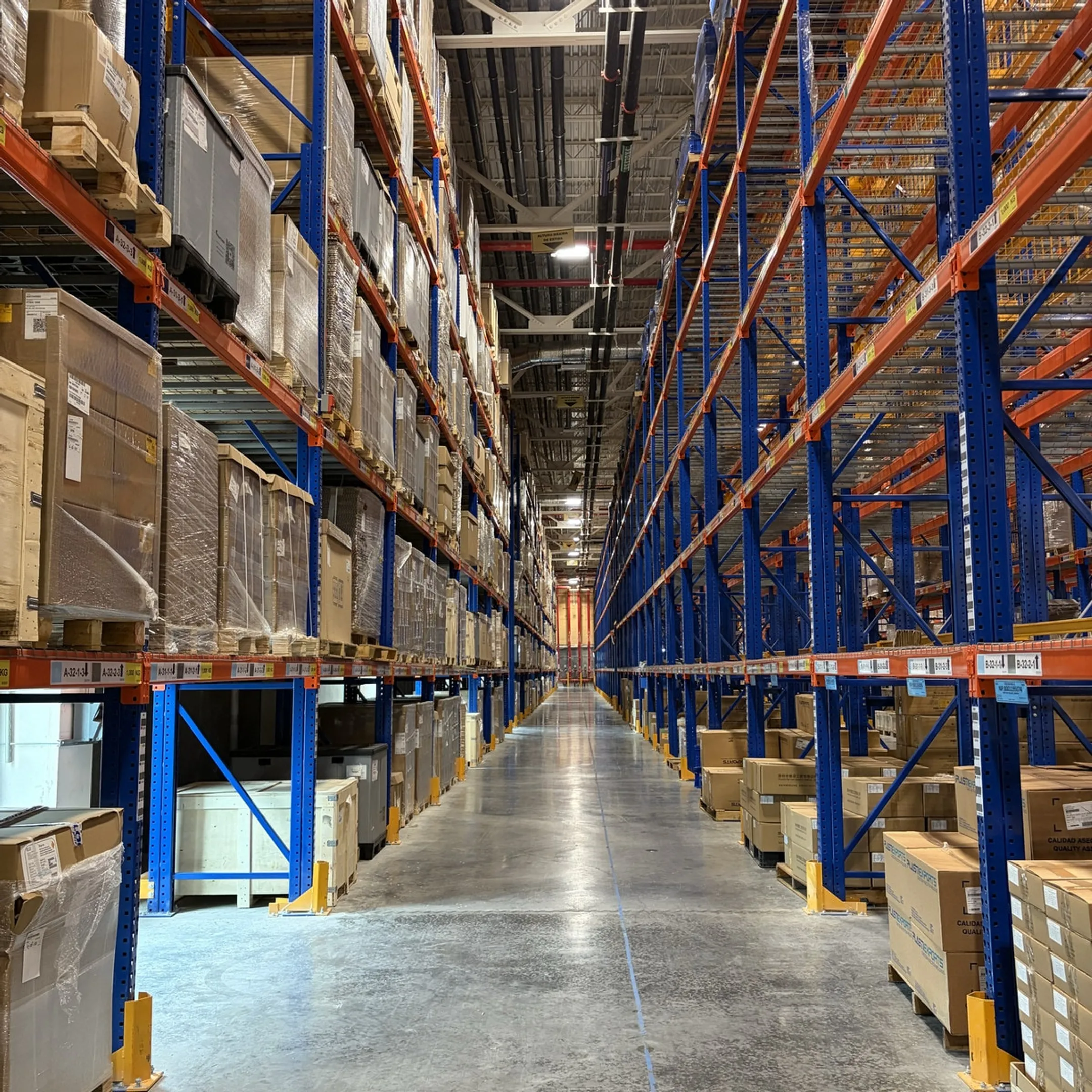 Engineers reviewing a warehouse racking layout