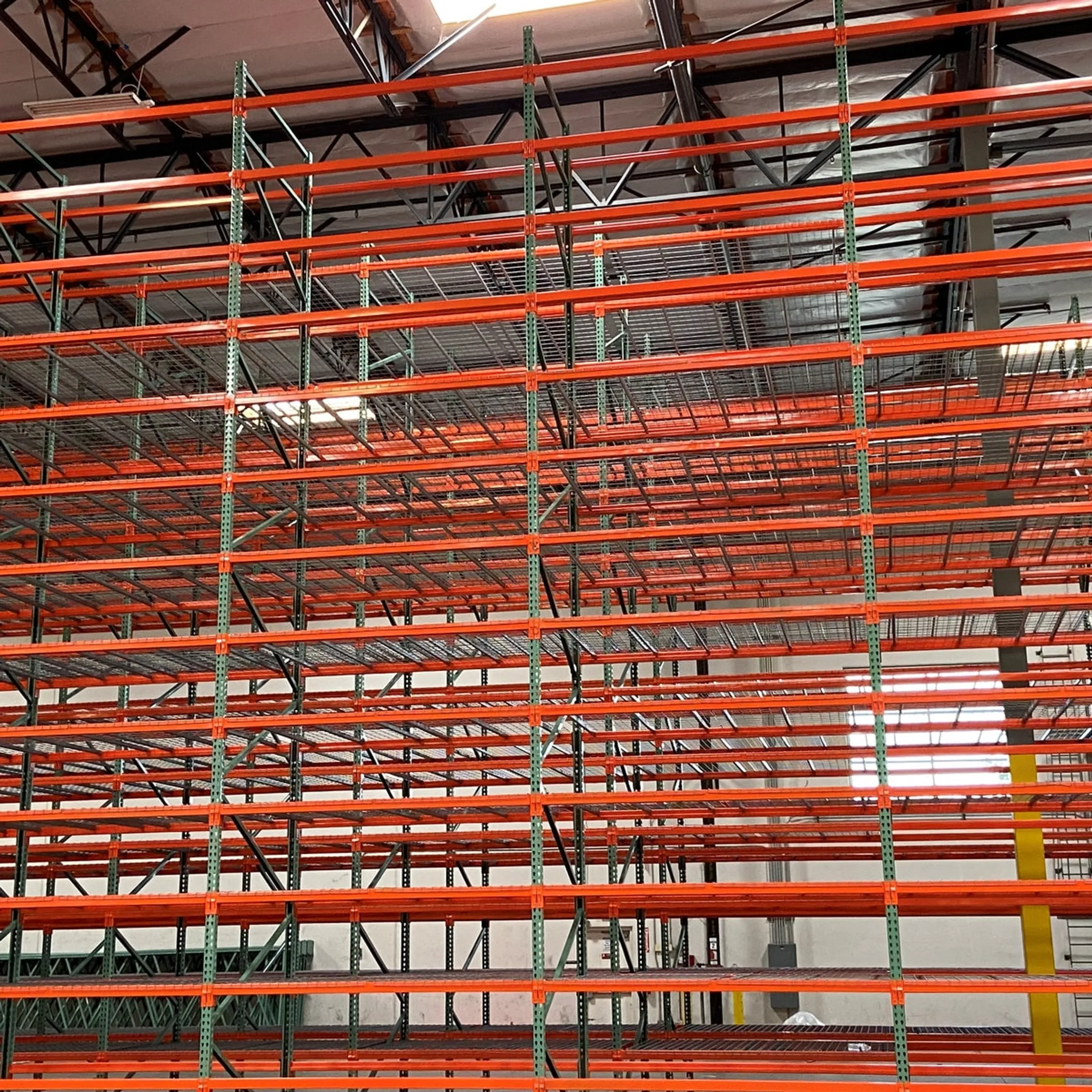 Warehouse team planning a selective rack layout
