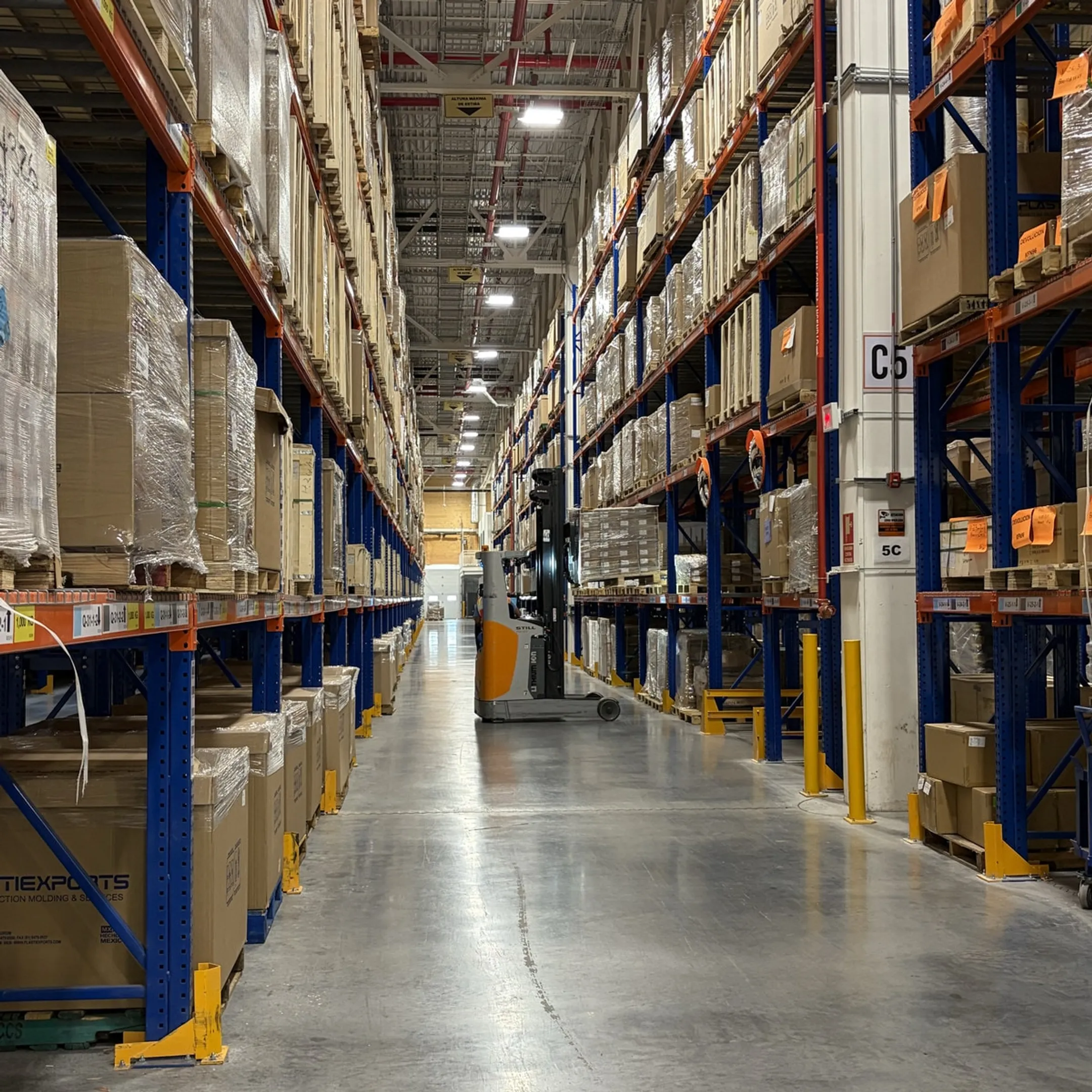 Warehouse team planning pallet racking layout