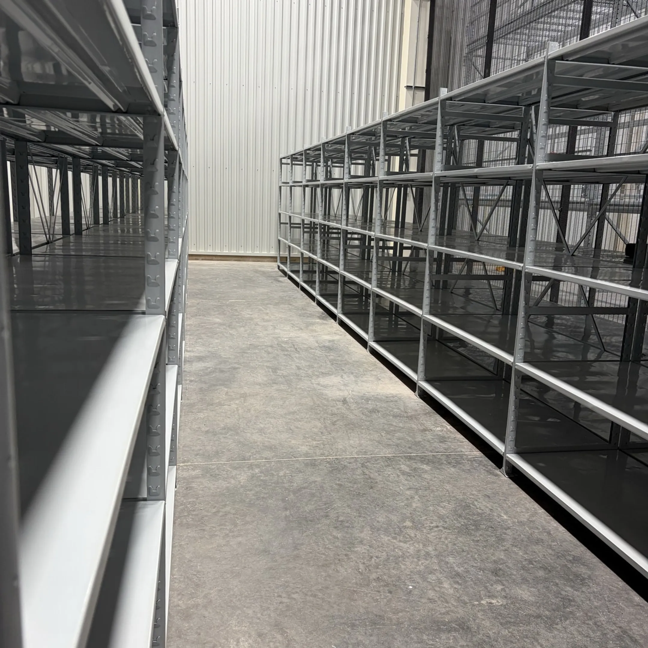 Warehouse professionals reviewing a racking layout