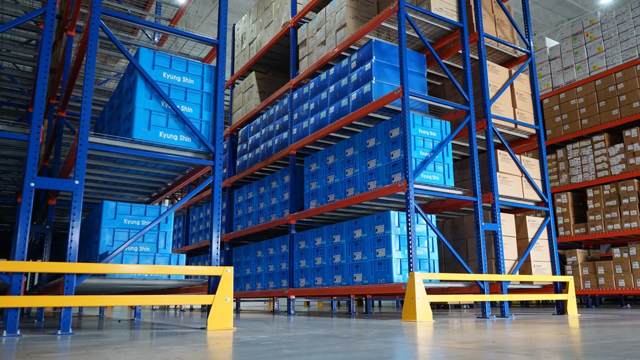 Warehouse mezzanine and multi-tier shelving maximizing vertical storage space