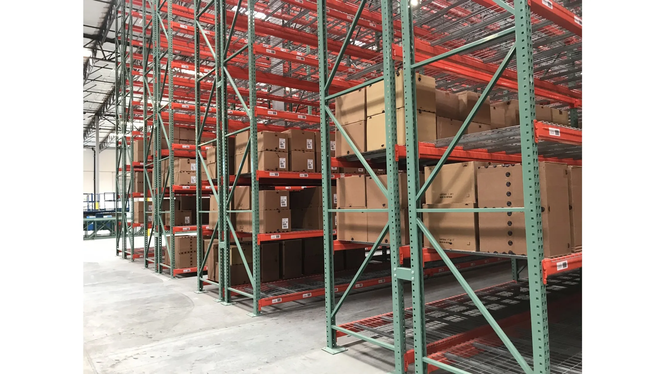 Warehouse mezzanine pick module with multiple elevated storage levels