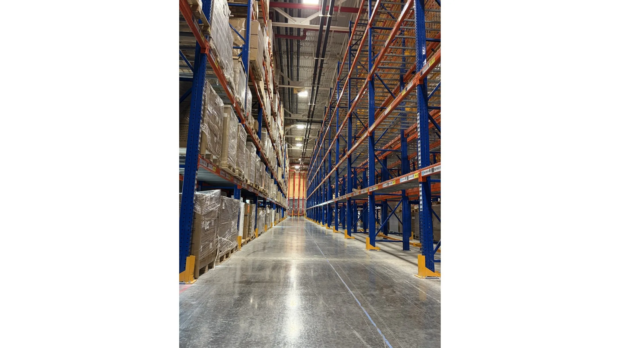 RackUSA engineering team designing narrow aisle pallet racking layout for warehouse client
