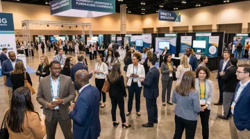 Nonprofit fundraising conference attendees networking in large convention hall