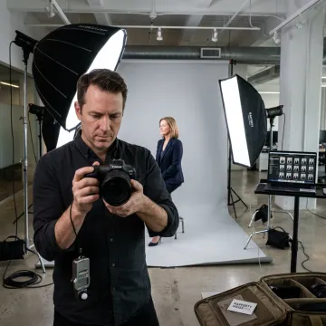 Corporate photographer taking executive headshots